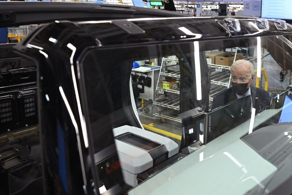 us president joe biden looks inside a gmc hummer ev on an assembly line as he tours the general motors factory zero electric vehicle assembly plant in detroit, michigan on november 17, 2021 photo by mandel ngan afp photo by mandel nganafp via getty images
