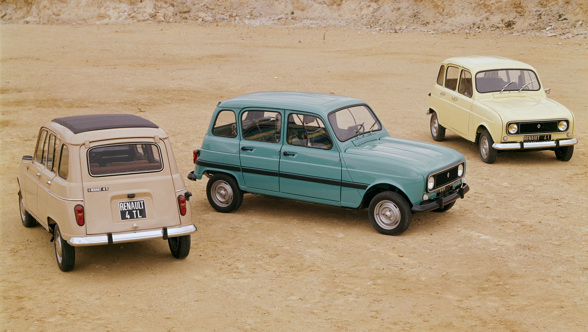 a group of cars parked in a desert