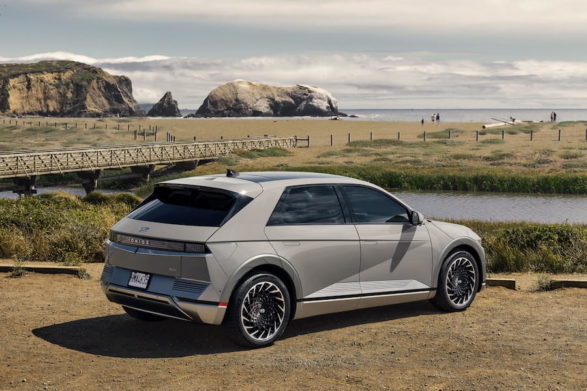 a gray hyundai ioniq 5 parked in front of an expansive landscape